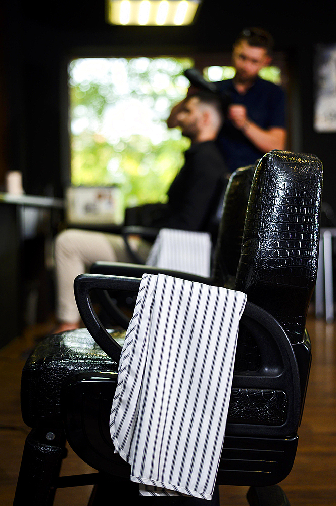 Hair salon chair with towel armchair