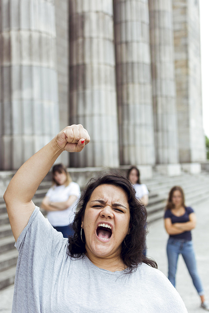 Portrait female women marching together