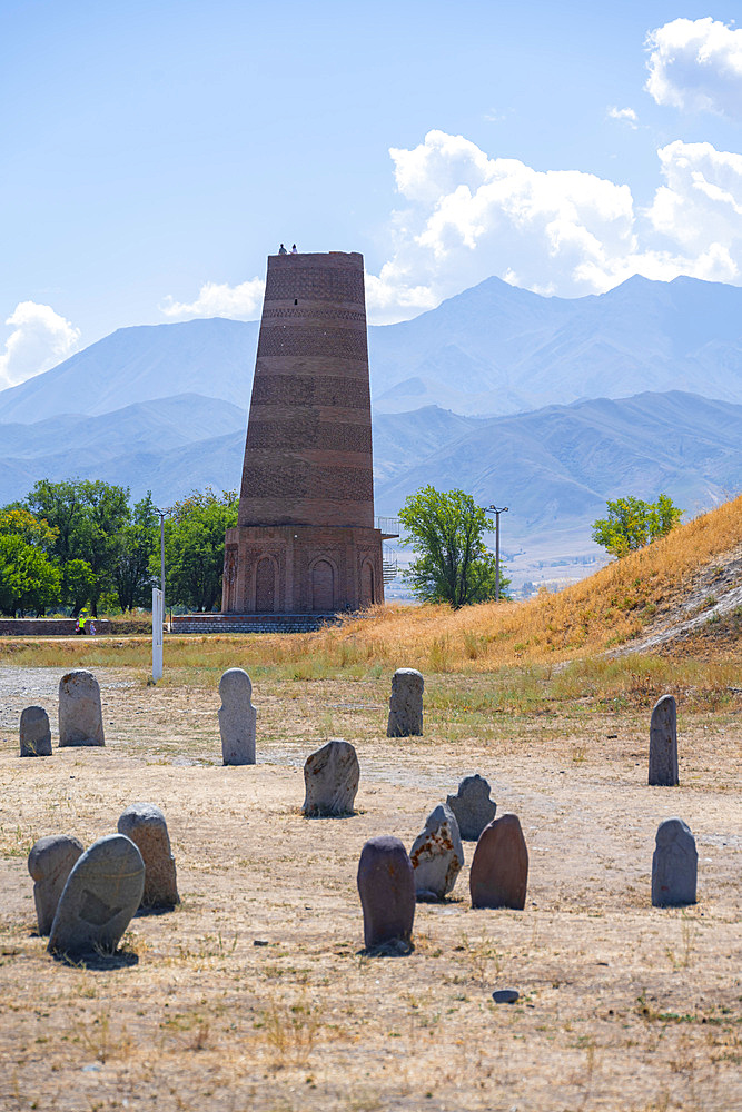 Burana Tower, remains of Karakhanid Minaret, histroic ancient city of Balasagun on the Silk Road, Balbals, historic tombstones in the shape of human faces, near Tokmok, Chuy, Kyrgyzstan, Asia