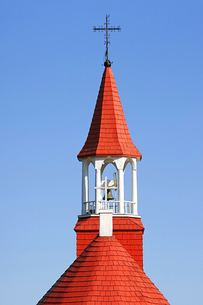 The wooden red roof of the old church of Tadoussac, also known as