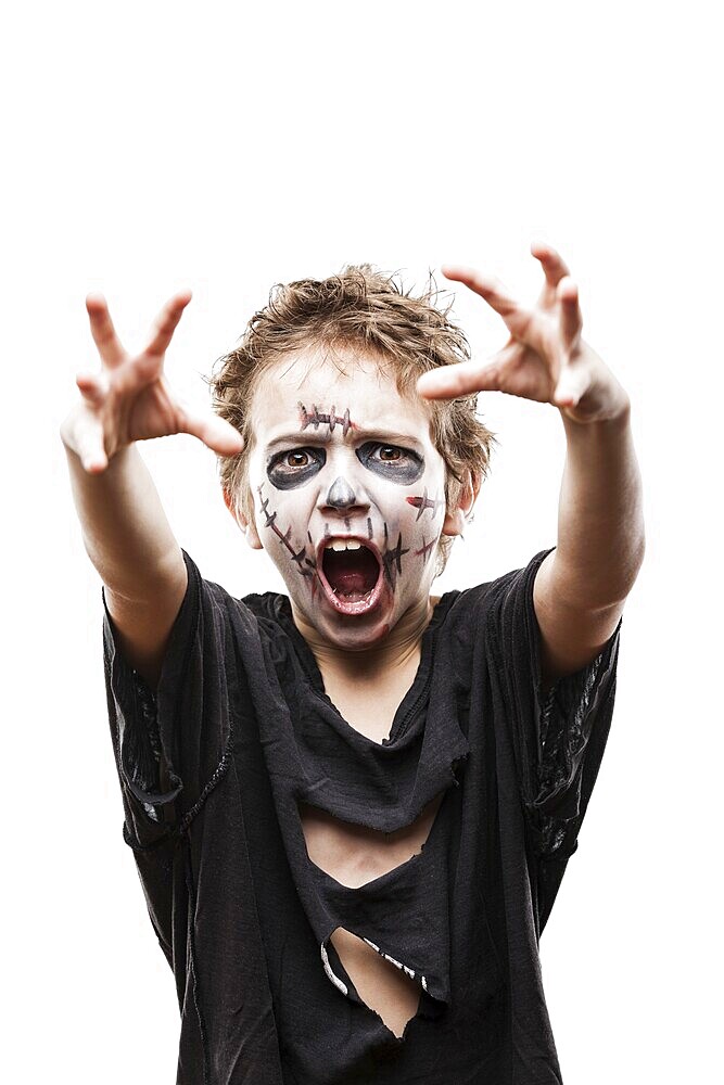 Halloween or horror concept, screaming walking dead zombie child boy reaching hand white isolated