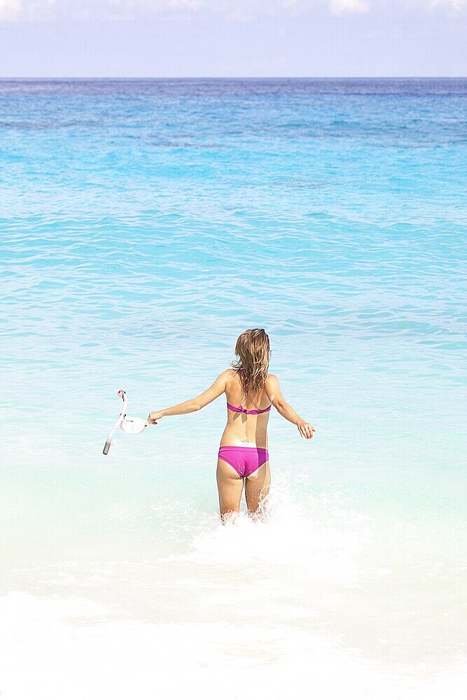 Snorkel Woman Running at the Tropical Beach