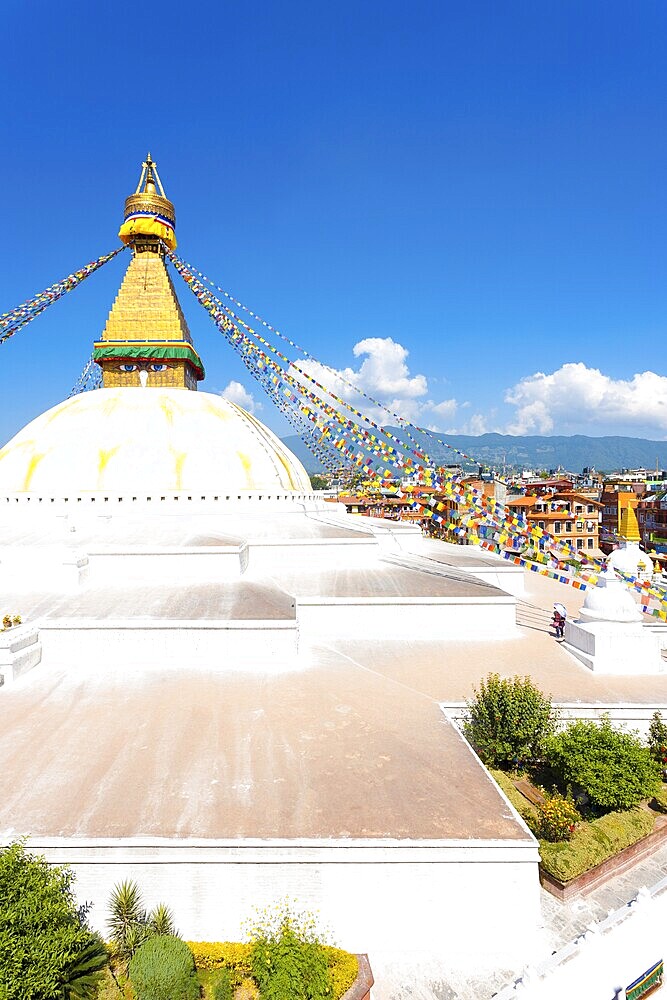 Aerial view of Boudhanath Stupa on blue sky day in Kathmandu, Nepal, Asia