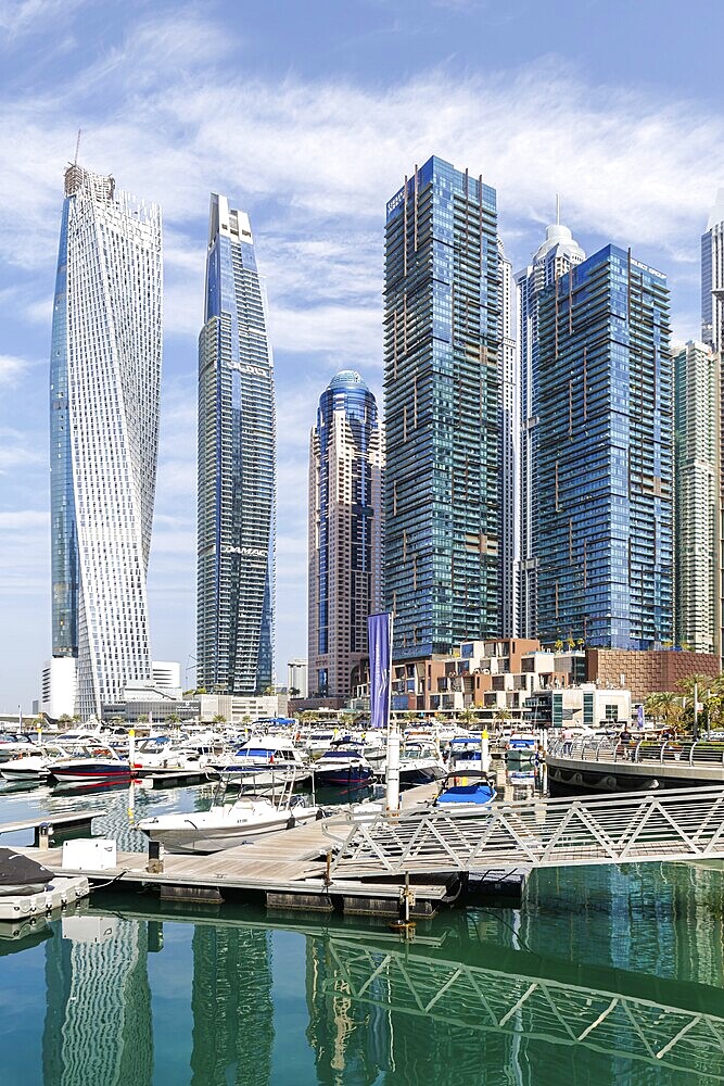 Dubai Marina skyline skyscrapers with yachts property skyscrapers living on the waterfront in Dubai, United Arab Emirates, Asia