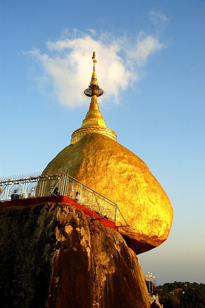 Golden Rock with stupa and cloud Kyaikhtiyo Pagoda Bago Burma