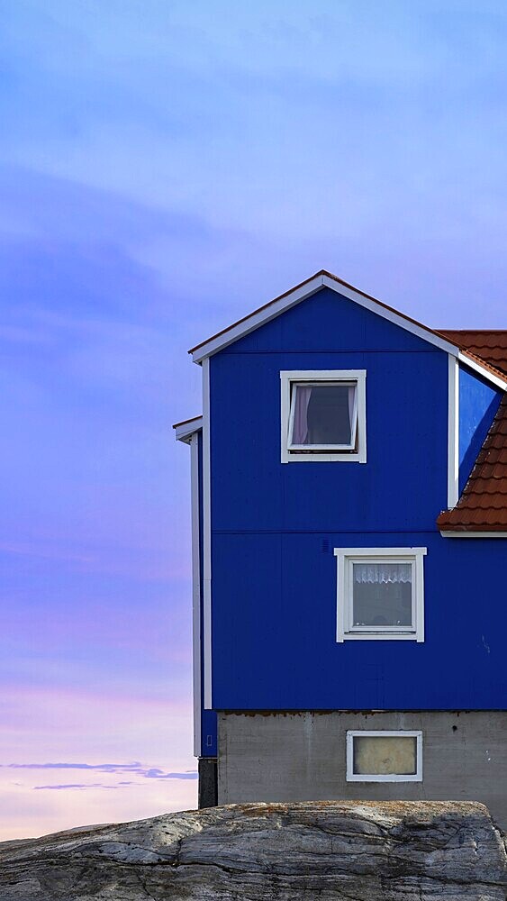 Typical architecture of Greenland Ilulissat with colored houses located near fjords and icebergs
