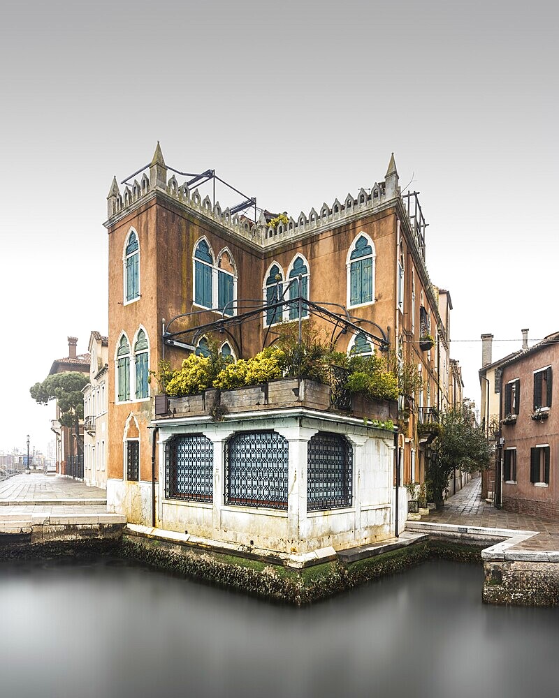 Long exposure of a classic Venetian house off the beaten track in Venice, Italy