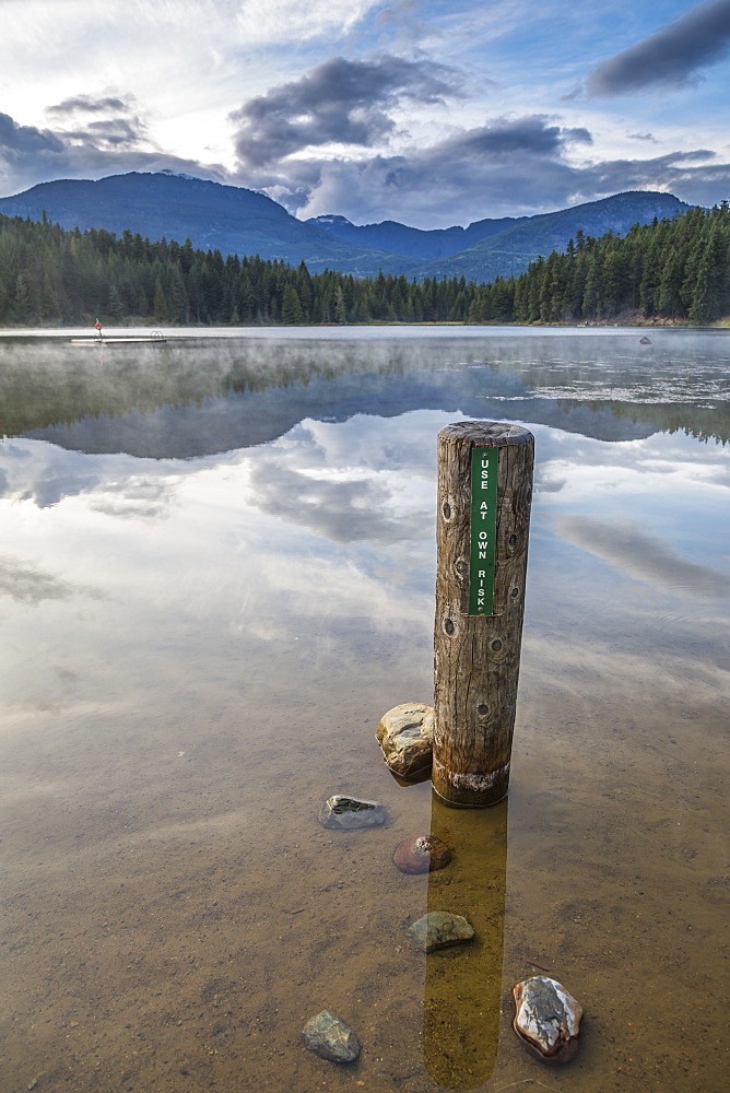 Mist on Lost Lake, Ski Hill and surrounding forest, Whistler, British Columbia, Canada, North America