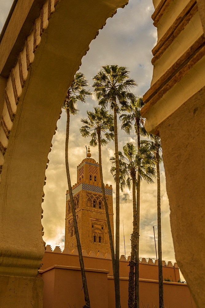 View of Koutoubia Mosque and palm trees through archway, UNESCO World Heritage Site, Marrakesh (Marrakech), Morocco, North Africa, Africa