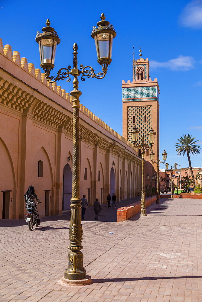 View of Moulay El Yazid Mosque framed with ornate lampost, Marrakesh, Morocco, North Africa, Africa