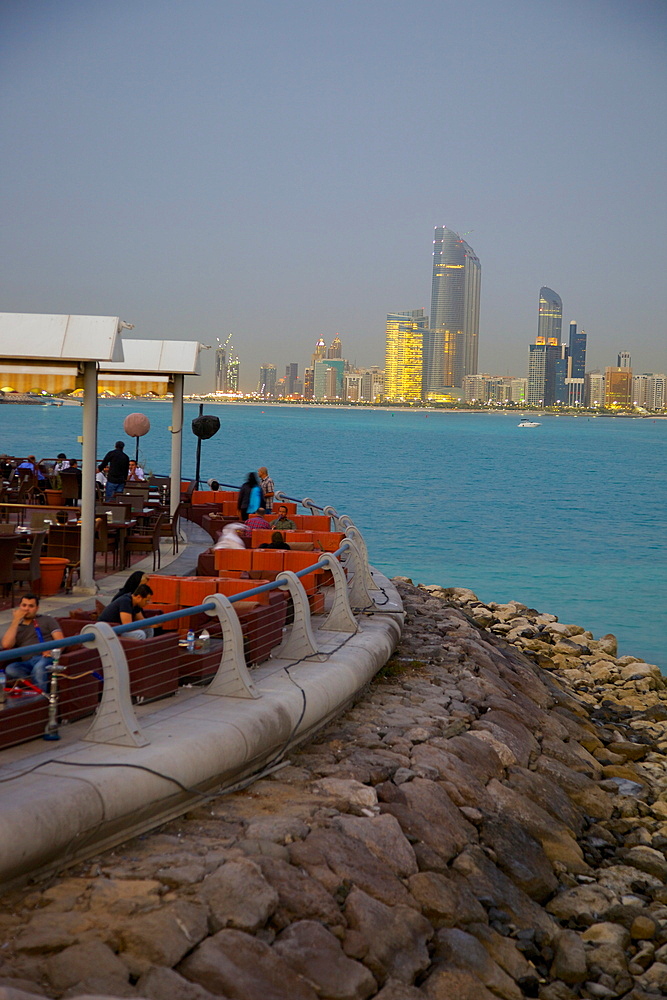View of city from Marina Cafe at dusk, Abu Dhabi, United Arab Emirates, Middle East
