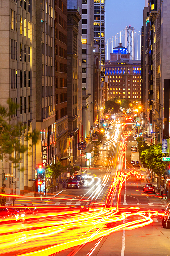 View of California Street and Oakland Bay Bridge at dusk, San Francisco, California, United States of America, North America