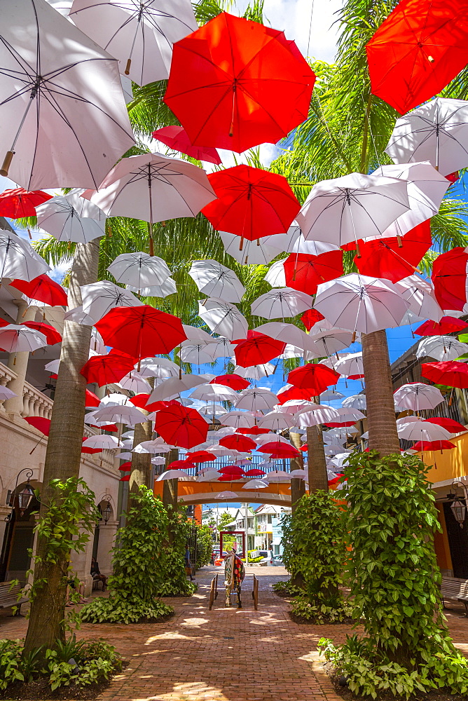 Red and white umbrellas in shopping mall at Holetown, Barbados, West Indies, Caribbean, Central America