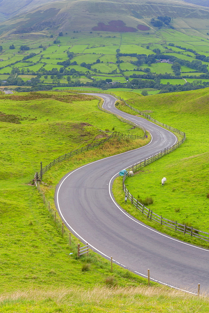 View of winding road toward Edale, Vale of Edale, Peak District National Park, Derbyshire, England, United Kingdom, Europe