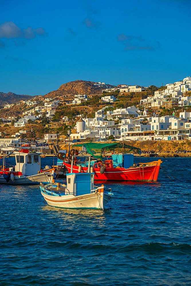 View of boats in harbour, Mykonos Town at sunset, Mykonos, Cyclades Islands, Greek Islands, Aegean Sea, Greece, Europe