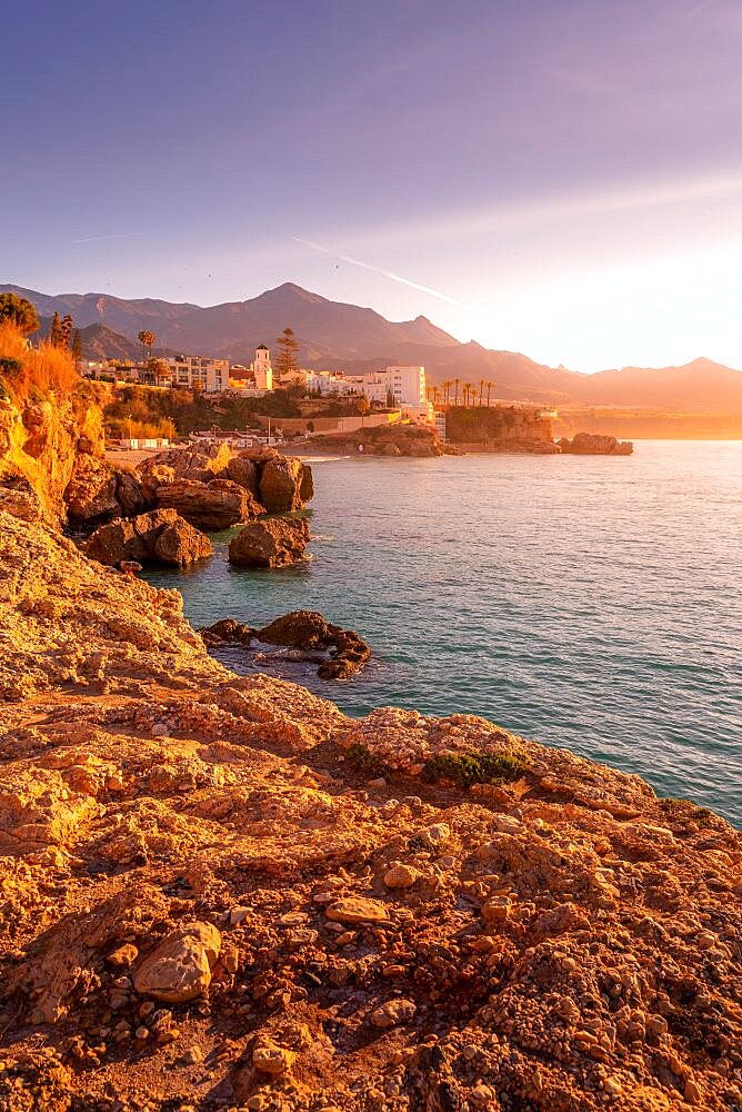 View of coastline and Iglesia de El Salvador Church at sunrise in Nerja, Costa del Sol, Malaga Province, Andalusia, Spain, Europe