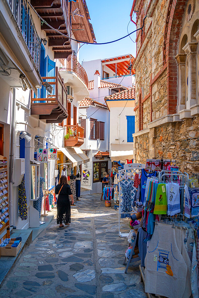 View of shops in narrow street, Skopelos Town, Skopelos Island, Sporades Islands, Greek Islands, Greece, Europe