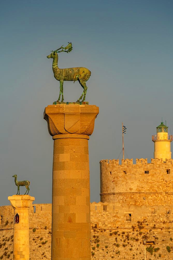 View of deer statues and Saint Nicholas Fortress, Old Town of the City of Rhodes, Rhodes, Dodecanese Islands, Greek Islands, Greece, Europe