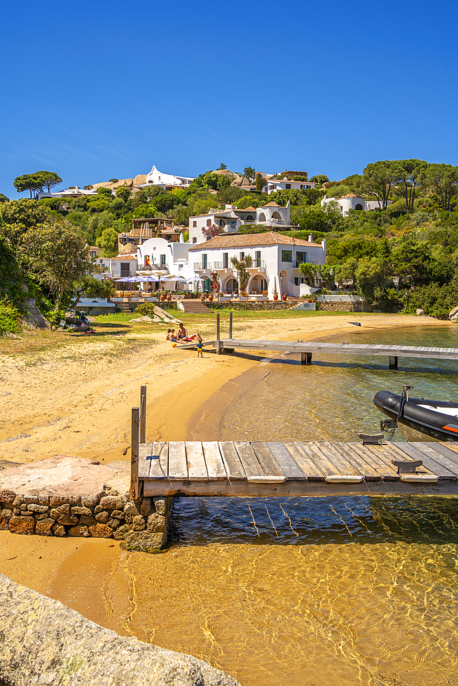 View of beach and whitewashed villas of Porto Rafael, Sardinia, Italy, Mediterranean, Europe