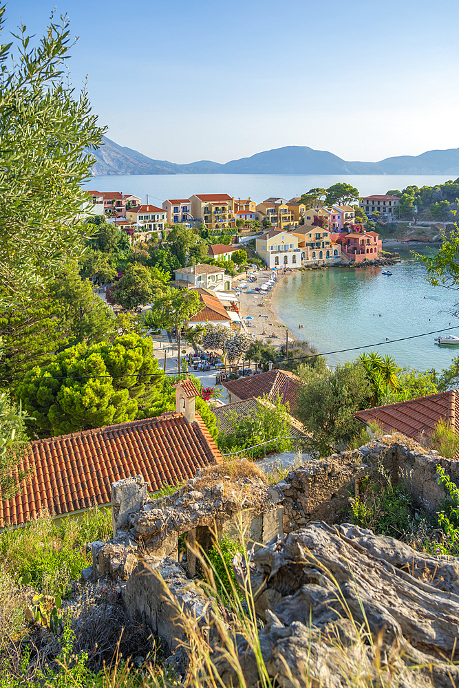 Elevated view of harbour and colourful houses in Assos, Assos, Kefalonia, Ionian Islands, Greek Islands, Greece, Europe