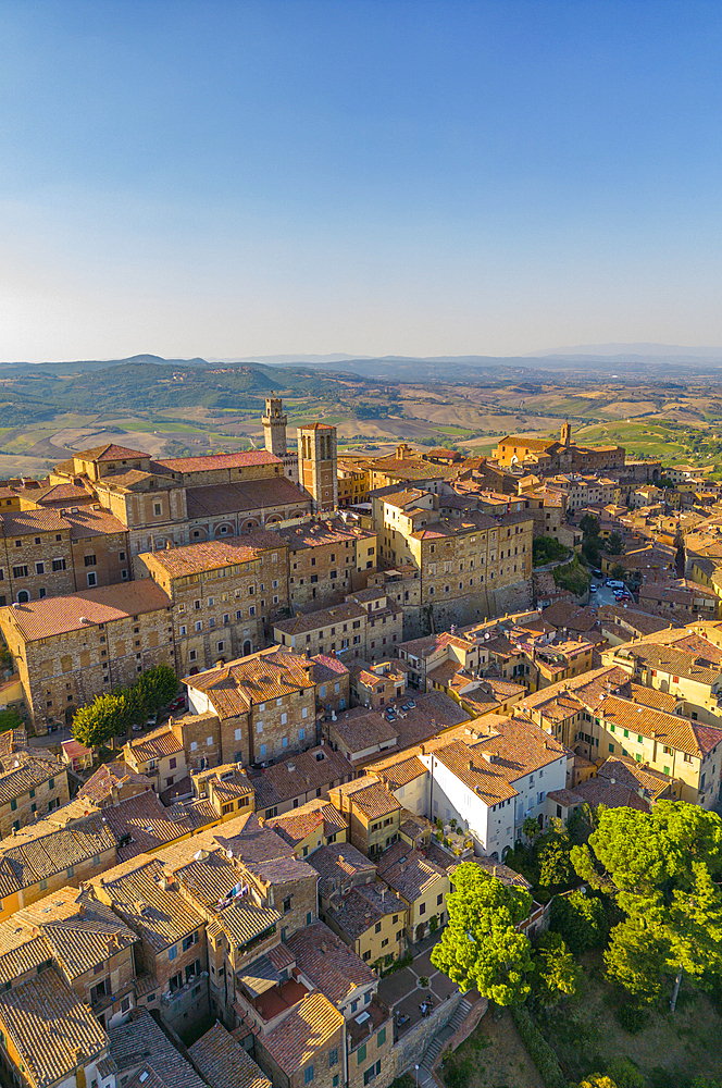 Elevated view of rooftops and town of Montepulciano at sunset, Montepulciano, Tuscany, Italy, Europe