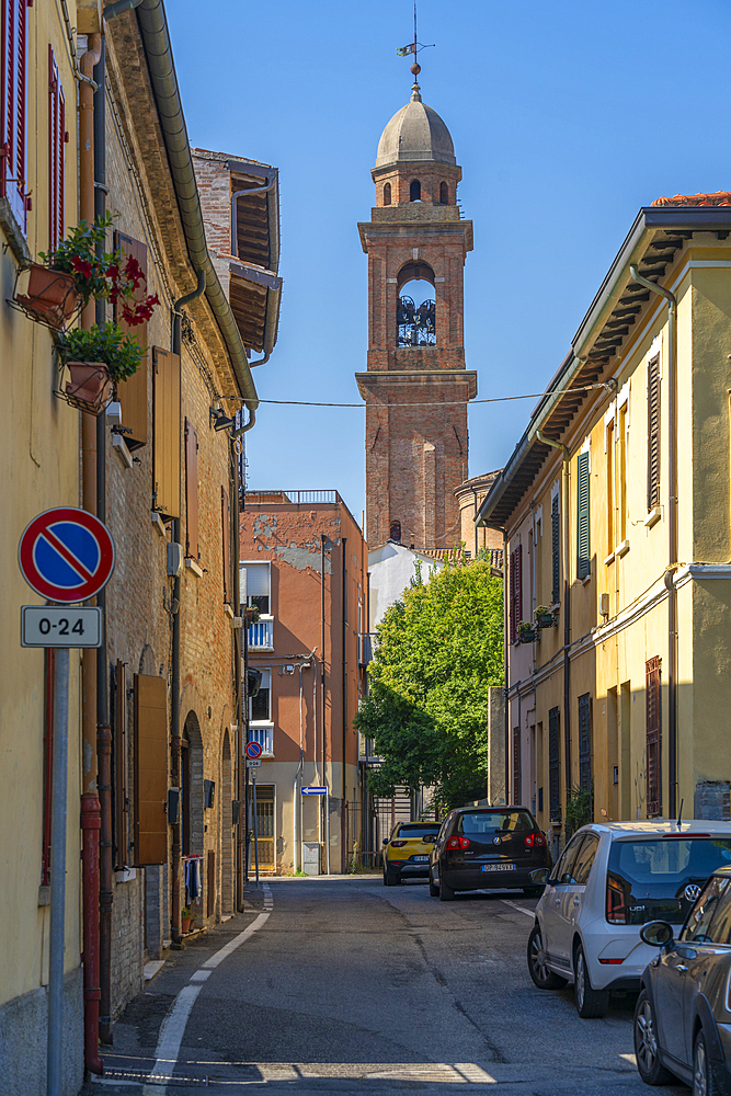 View of church bell tower and narrow street in Rimini, Rimini, Emilia-Romagna, Italy, Europe