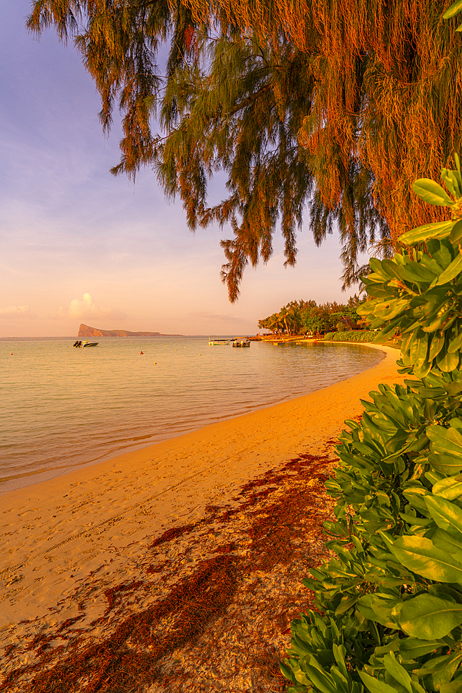 View of beach and Indian Ocean at sunset in Cap Malheureux, Mauritius, Indian Ocean, Africa