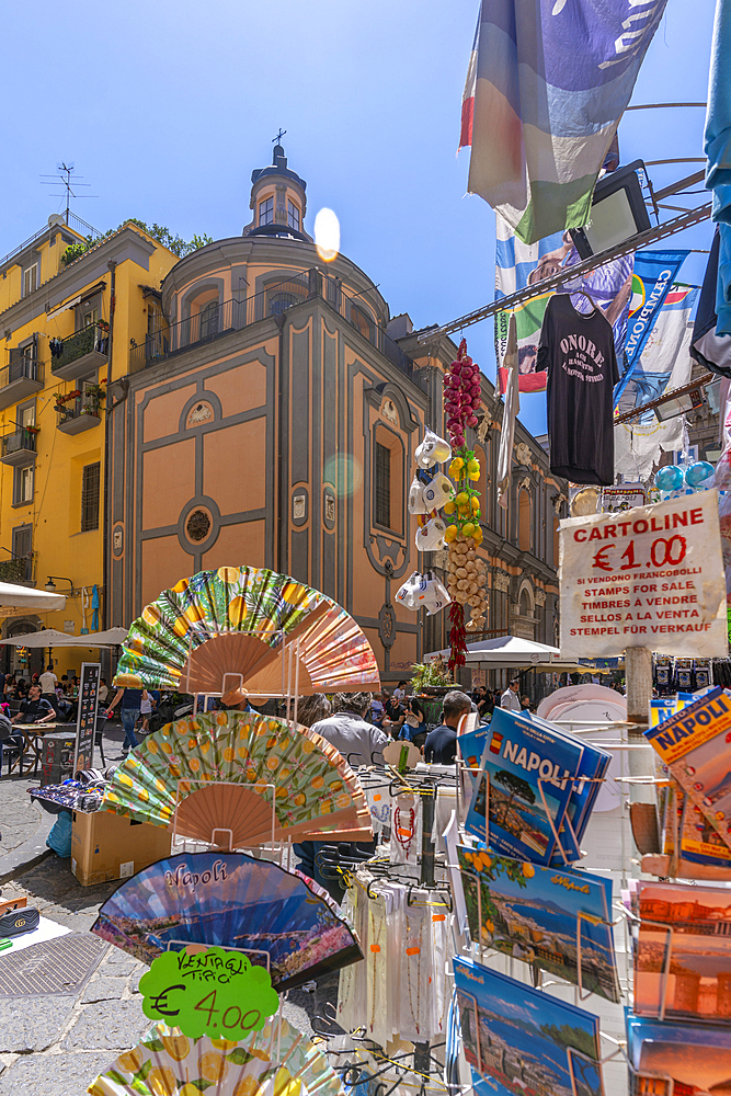 View of Sant'Angelo a Nilo church, shop and architecture on bustling Piazzetta Nilo, Naples, Campania, Italy, Europe