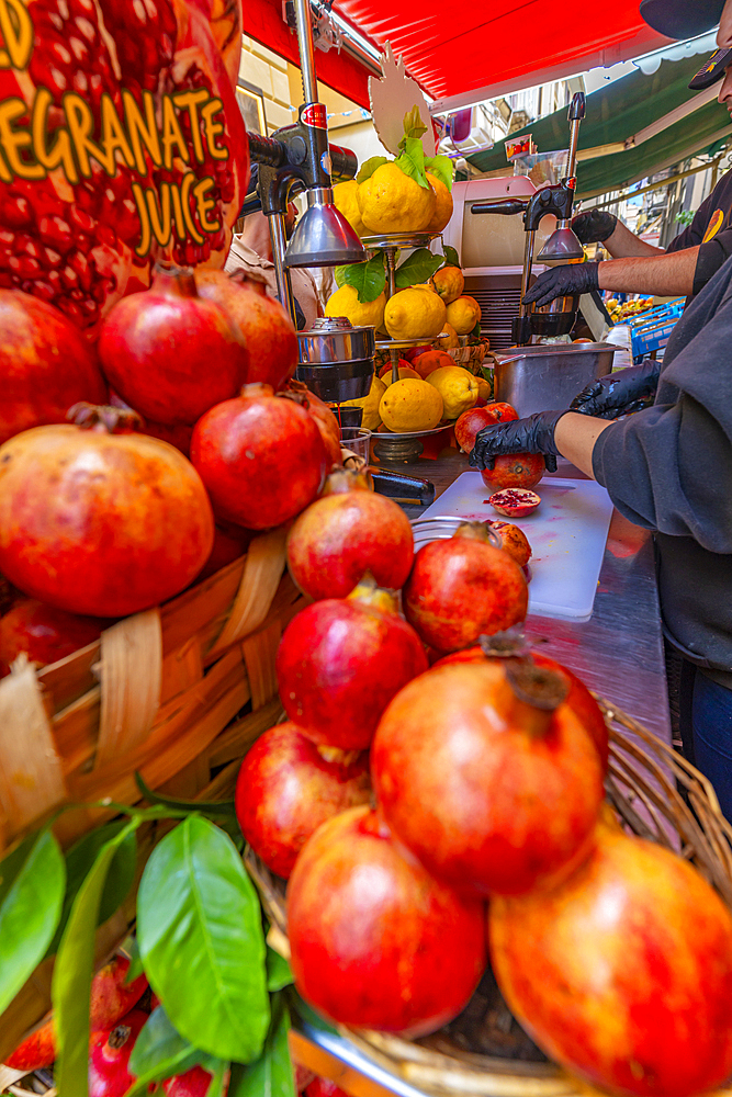 View of fresh fruit drinks of lemon and pomegranate, made in narrow street, Sorrento, Campania, Italy, Mediterranean, Europe