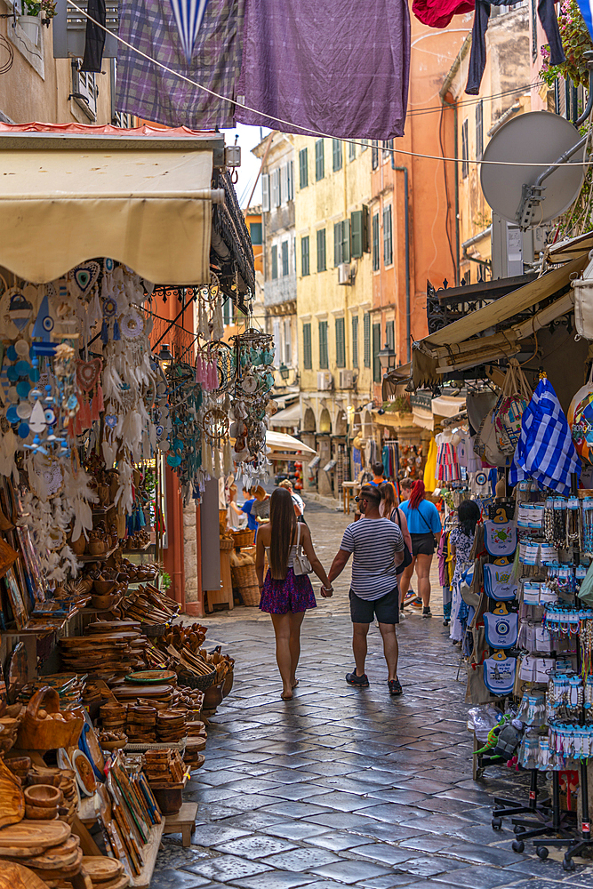 View of shops and cafes in narrow street, Corfu Town, Corfu, Ionian Sea, Greek Islands, Greece, Europe