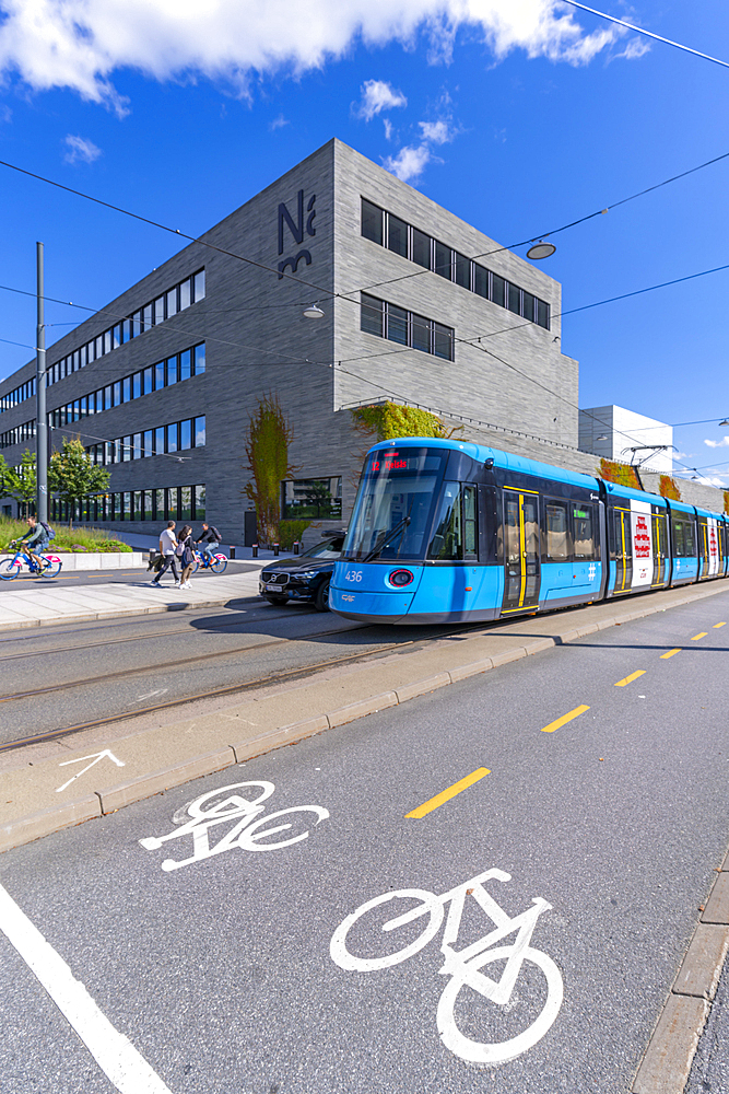 View of The National Museum and city tram, Aker Brygge, Oslo, Norway, Scandinavia, Europe