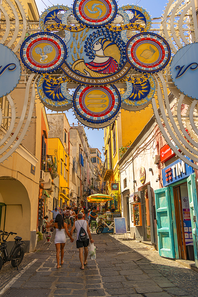 View of shops on Via Vittorio Emanuele in the fishing port, Procida, Phlegraean Islands, Gulf of Naples, Campania, Southern Italy, Italy, Europe