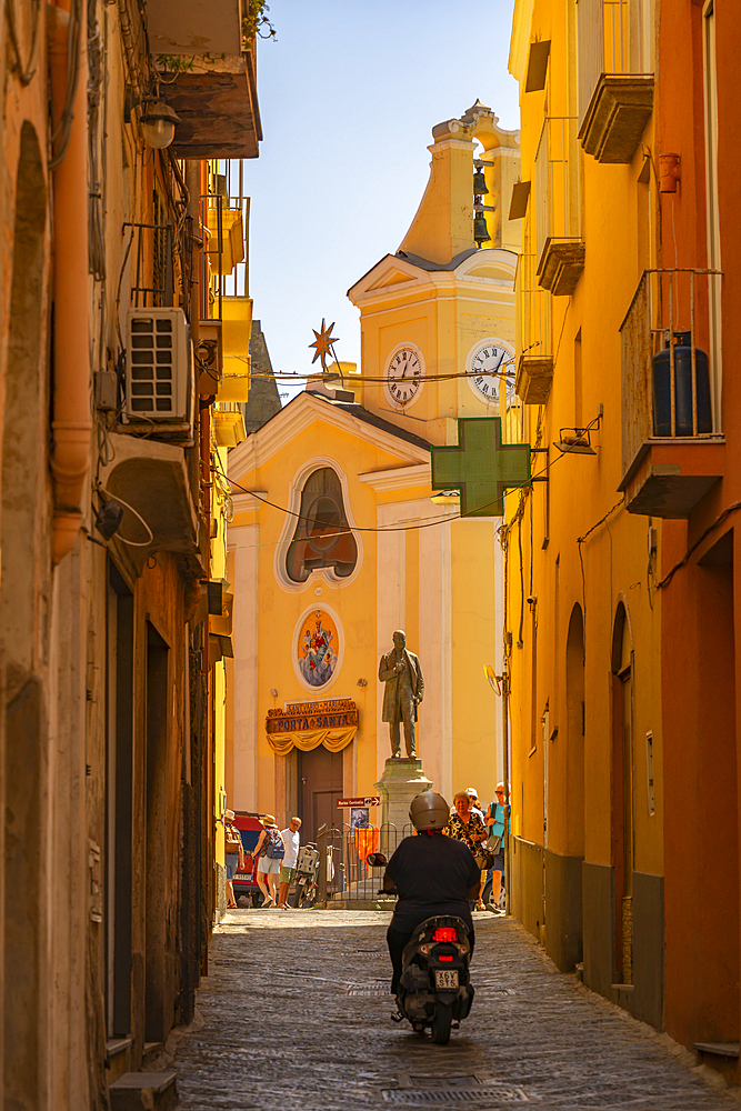 View of colourful narrow backstreet and Church of Santa Maria delle Grazie, Procida, Phlegraean Islands, Gulf of Naples, Campania, Southern Italy, Italy, Europe