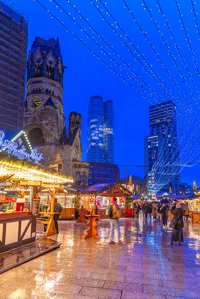 View of Kaiser Wilhelm Memorial Church and market stalls at Christmas, Breitscheidplatz, Berlin, Germany, Europe