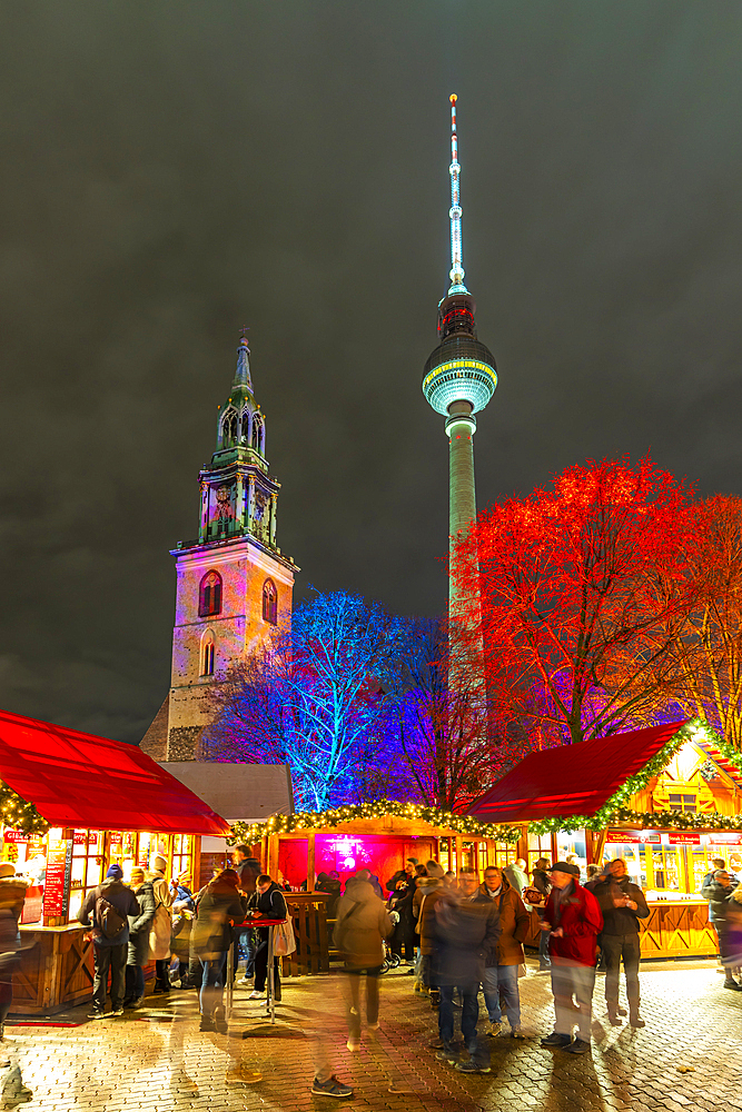 View of Berlin TV Tower, St. Mary's Church and Christmas market in Wasserkaskaden at dusk, Mitte, Berlin, Germany, Europe