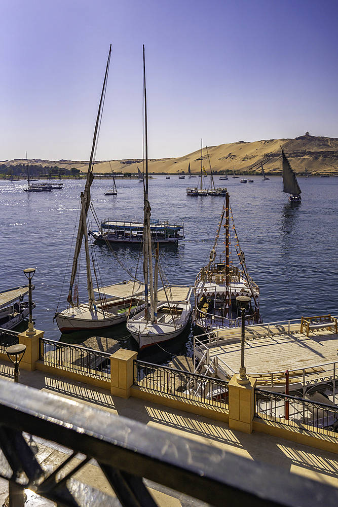 View of fellucas on the Nile river on a sunny day, Aswan, Nubia, Egypt, North Africa, Africa