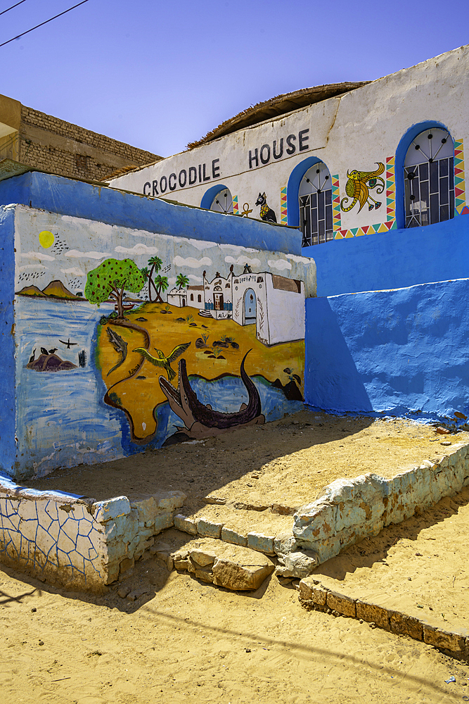 View of colourful architecture at Nagaa Suhayl Gharb on the Nile river near Aswan, Aswan, Nubia, Egypt, North Africa, Africa