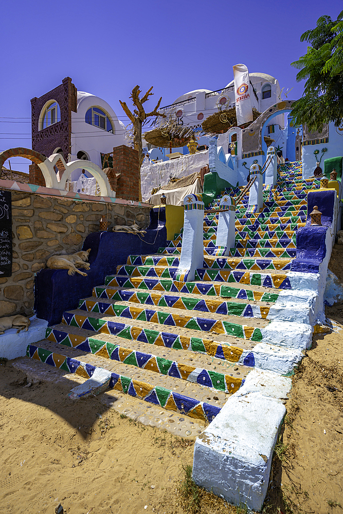 View of colourful architecture at Nagaa Suhayl Gharb on the Nile river near Aswan, Aswan, Nubia, Egypt, North Africa, Africa