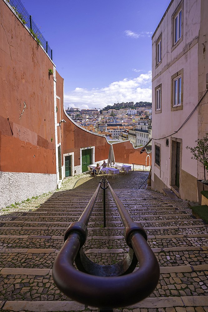 View of cafe and steps in Lisbon city centre, Lisbon, Portugal, Europe