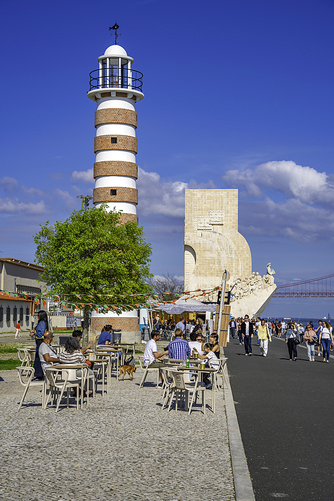 View of Belem Lighthouse and shops and stalls on a sunny day, Lisbon, Portugal, Europe