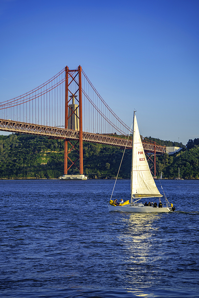 View of Tagus river 25 April Bridge on a sunny day, Lisbon, Portugal, Europe