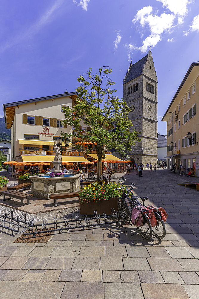 View of St. Hippolyte Church and Stadtplatz in Zell am See on a sunny day, Zell am See, Salzburg, Austria, Europe