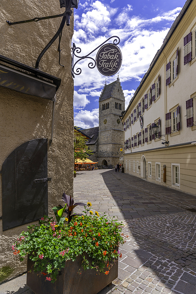 View of St. Hippolyte Church and Stadtplatz in Zell am See on a sunny day, Zell am See, Salzburg, Austria, Europe