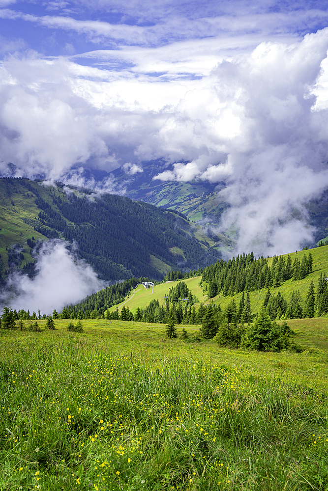 View of mountains and cloud from Schmittenhöhebahn top station 2000m on a sunny day, Zell am See, Salzburg, Austria, Europe