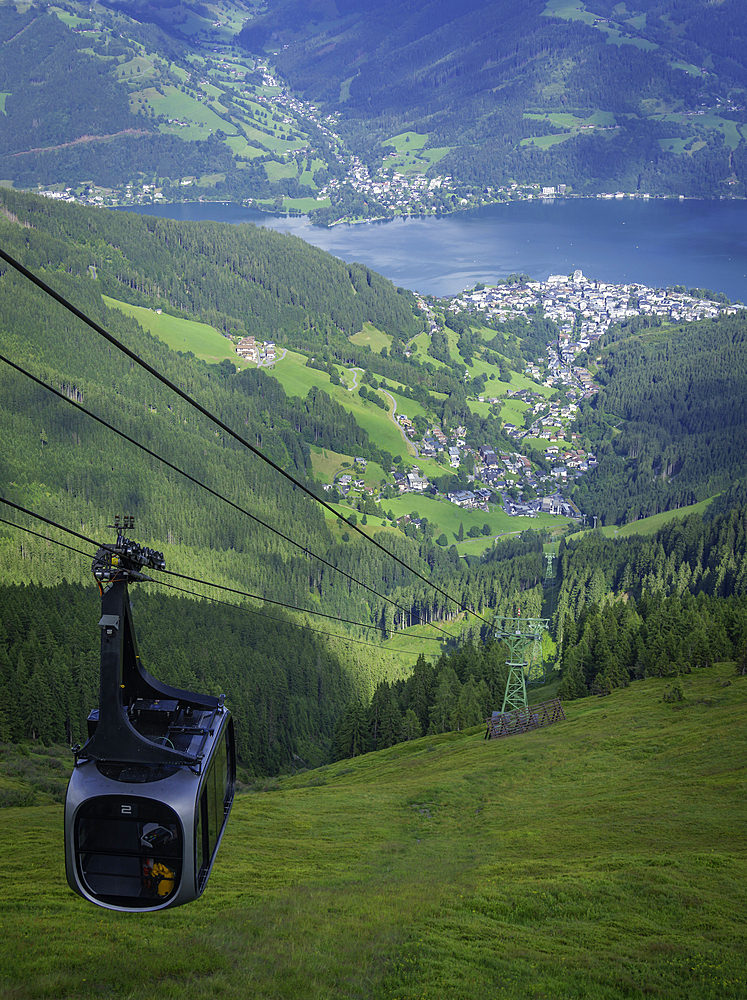 View of cable car, Zell am See and cloud from Schmittenhöhebahn top station 2000m on a sunny day, Zell am See, Salzburg, Austria, Europe