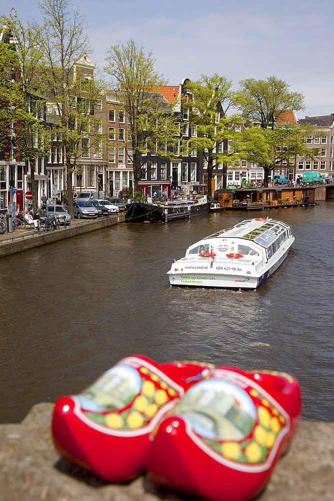 Souvenir clogs and canal, Amsterdam, Holland, Europe