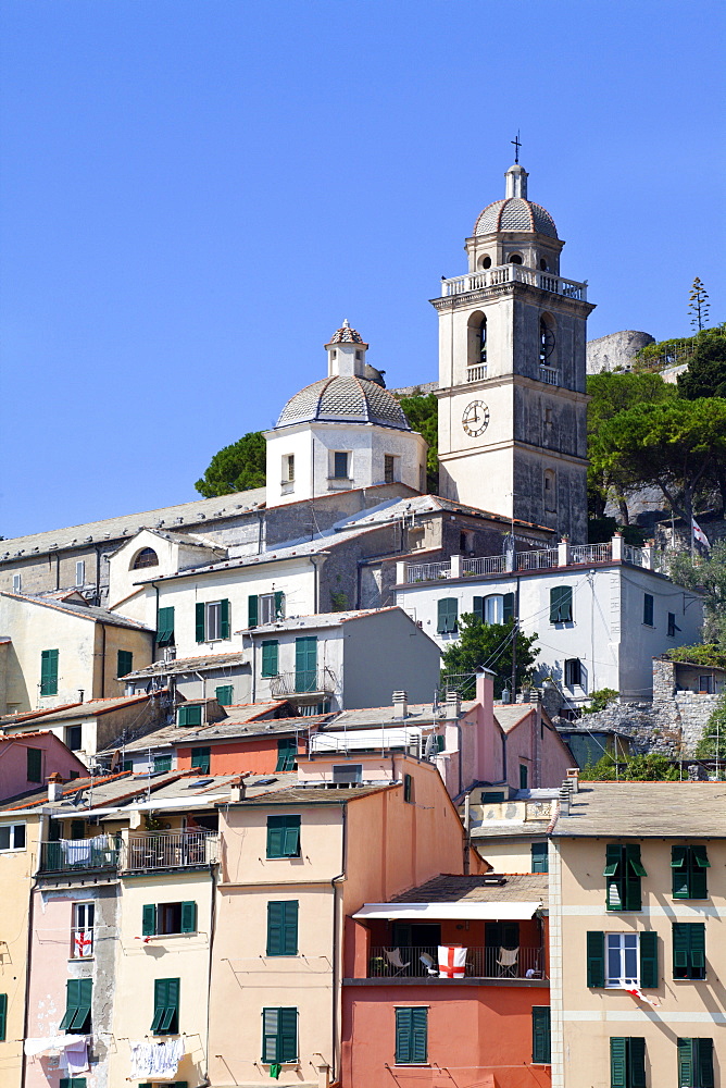 The Church of St. Lawrence sits above colourful buildings at Porto Venere, Cinque Terre, UNESCO World Heritage Site, Liguria, Italy, Europe 