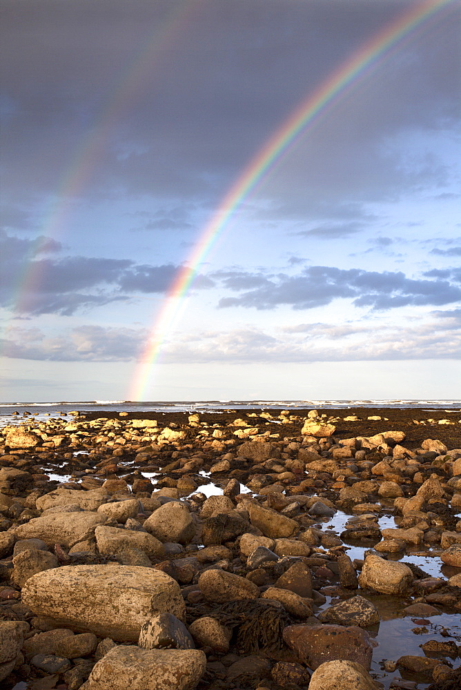 Rainbow over the sea at Robin Hoods Bay, Yorkshire, England, United Kingdom, Europe