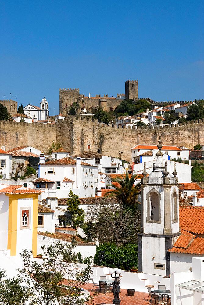 View of old town and castle walls, Obidos, Estremadura, Portugal, Europe