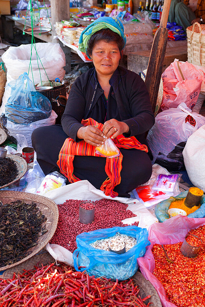 Spice seller at local market, Nampan, Inle Lake, Shan State, Myanmar (Burma), Asia